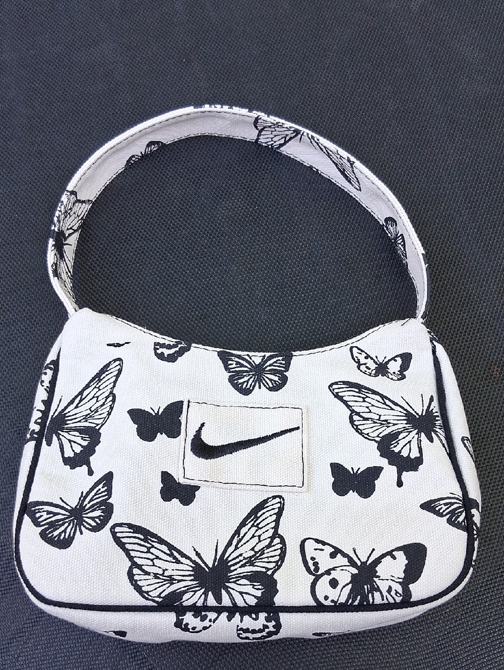 Nike White Mini‎ Bag with Black Butterfly Print